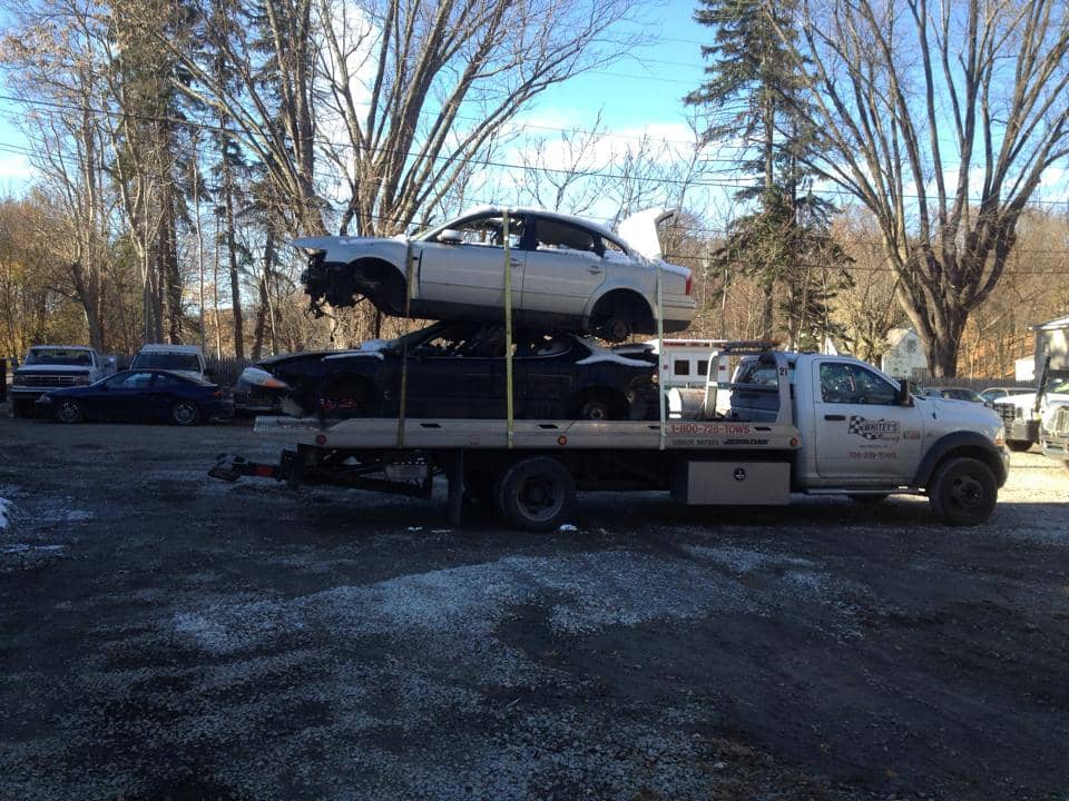 towing two stacked cars
