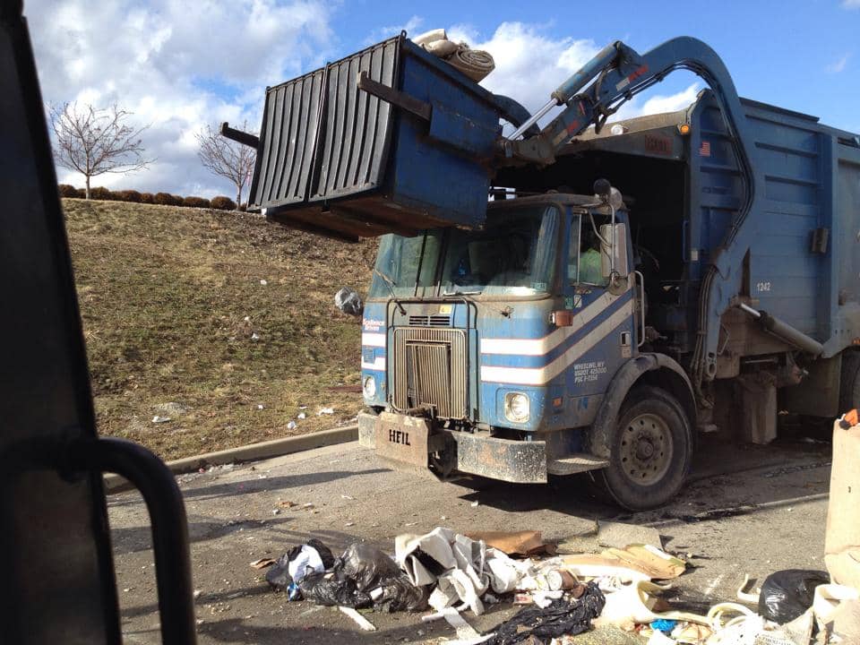 truck collecting trash